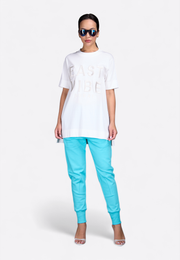 Model wearing casual white T-shirt, front view – East Vibe